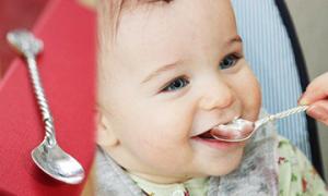 A silver spoon on the first tooth - a sign or a necessity?