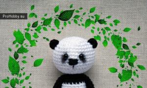 Panda con motivo a maglia.  Cucciolo di panda all'uncinetto.  Schema panda amigurumi all'uncinetto